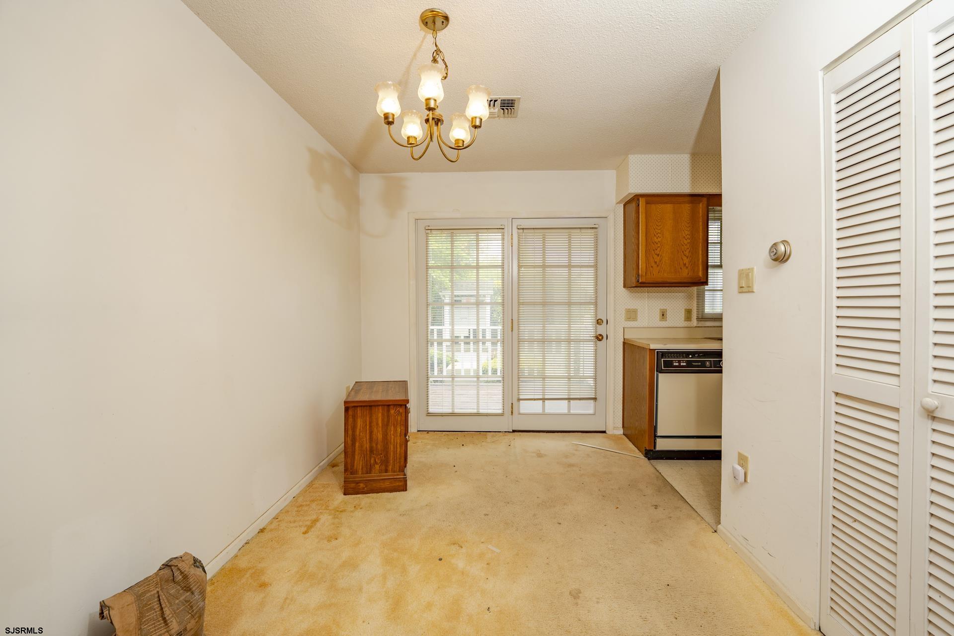 19 Clipper Court Atlantic City, NJ 08401 - Photo 5 of 53 a bedroom with a bed dresser and a window
