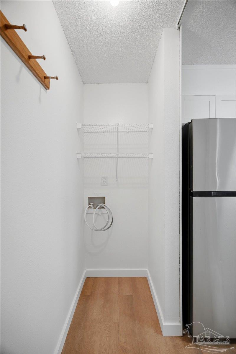 601 East Burgess Road, Unit C6 Pensacola, FL 32504 - Photo 23 of 39 a view of a storage & utility room with a refrigerator
