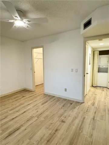 a view of outdoor space with swimming pool and green space