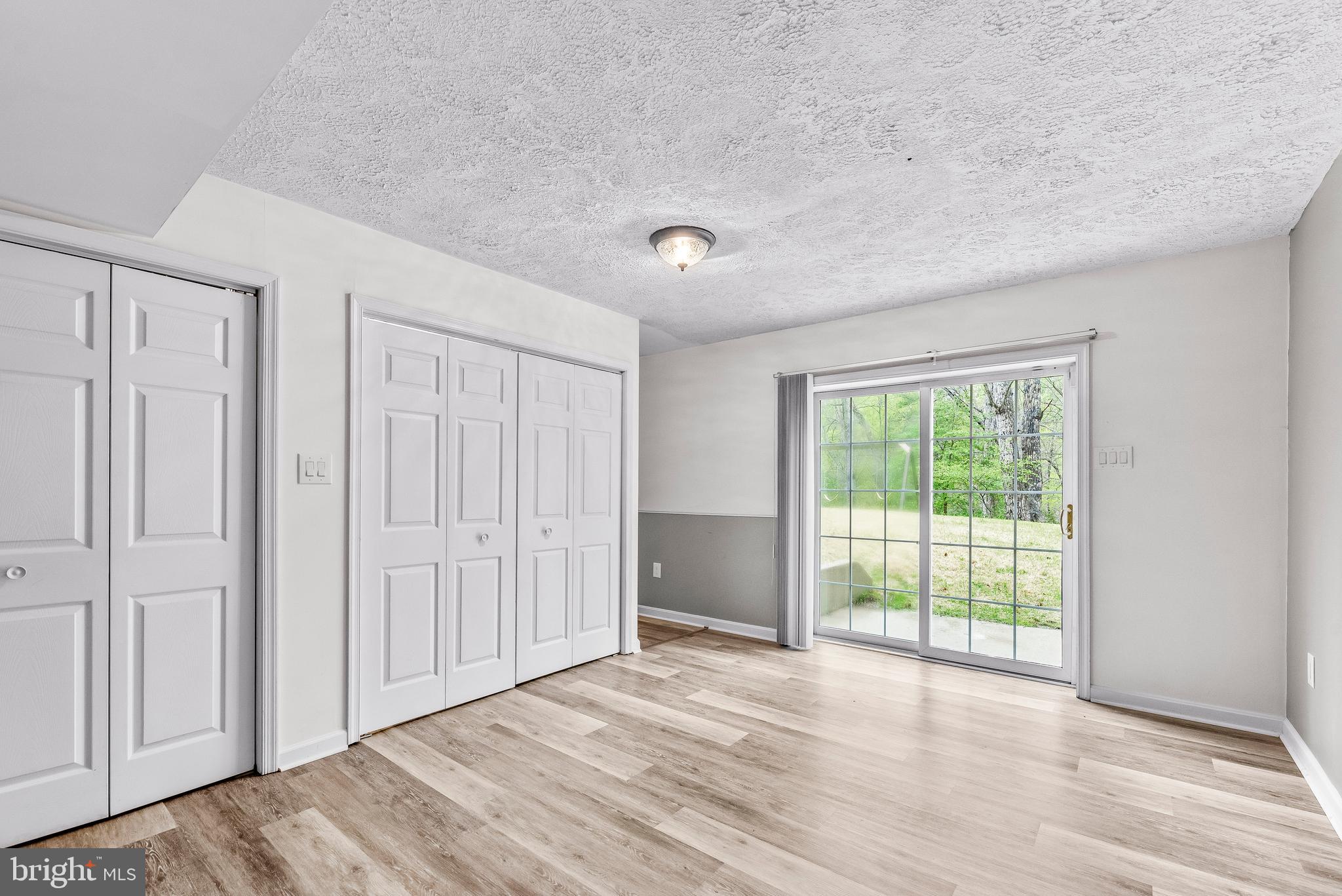 307 Red Cloud Road Lusby, MD 20657 - Photo 25 of 35 a view of an empty room with a window