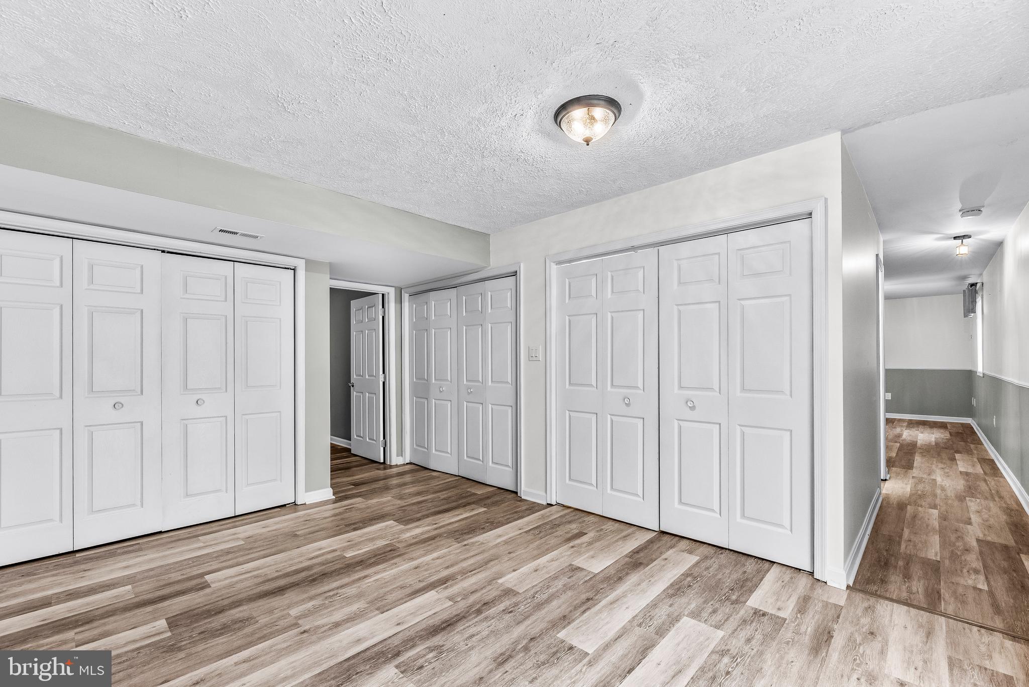 307 Red Cloud Road Lusby, MD 20657 - Photo 26 of 35 a view of a livingroom with wooden floor