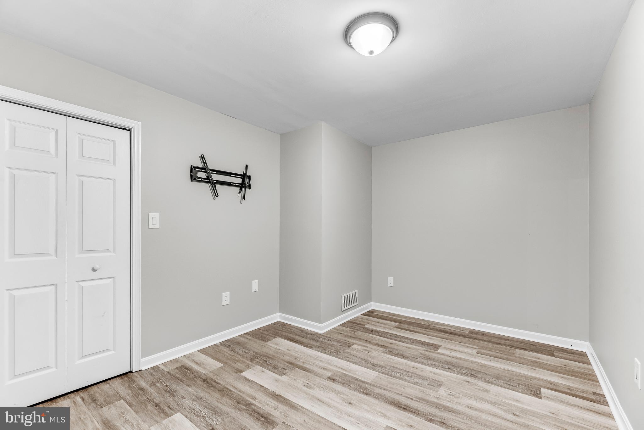 307 Red Cloud Road Lusby, MD 20657 - Photo 27 of 35 a view of a room with wooden floor