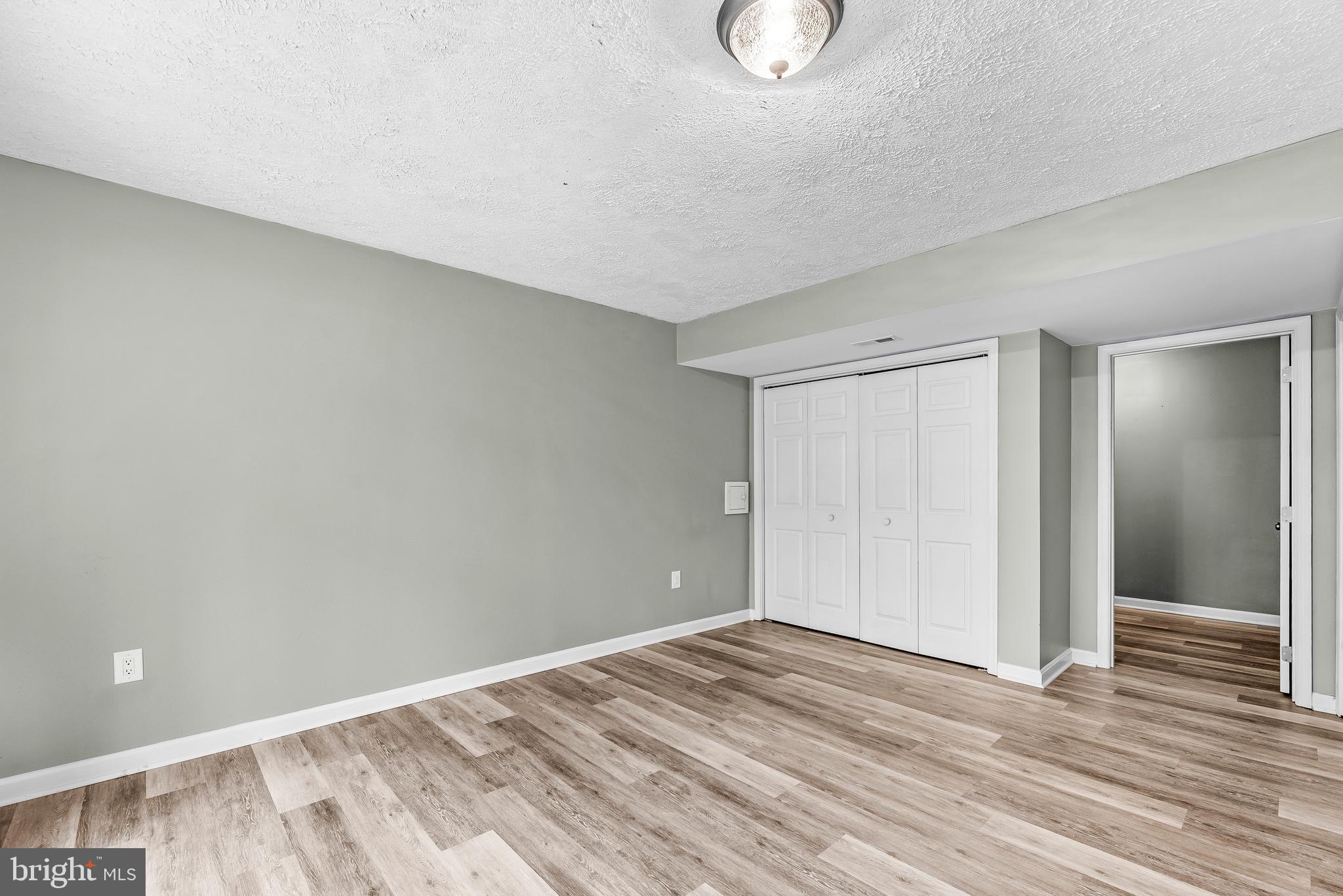 307 Red Cloud Road Lusby, MD 20657 - Photo 28 of 35 a view of a livingroom with wooden floor