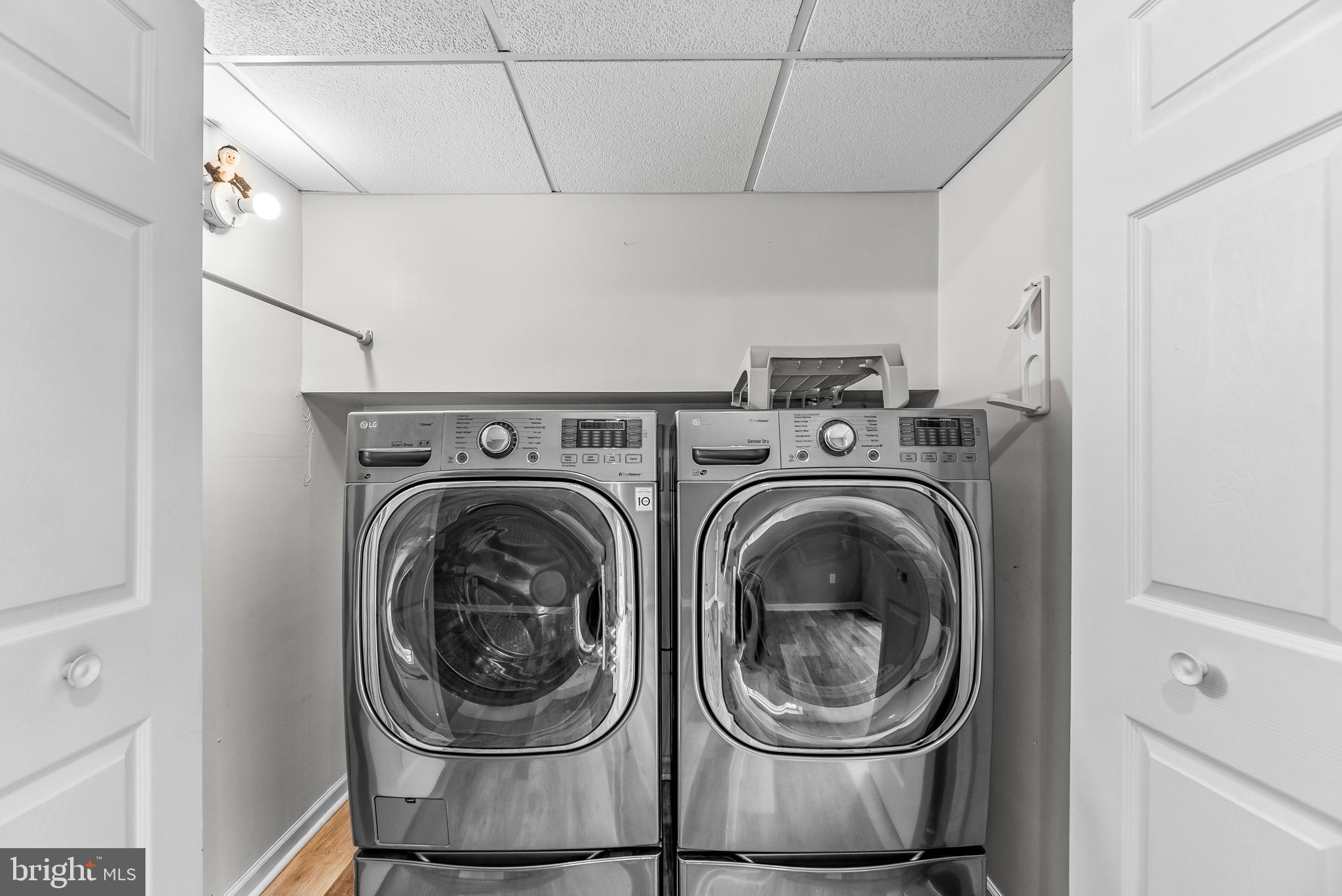 307 Red Cloud Road Lusby, MD 20657 - Photo 32 of 35 a utility room with dryer and washer