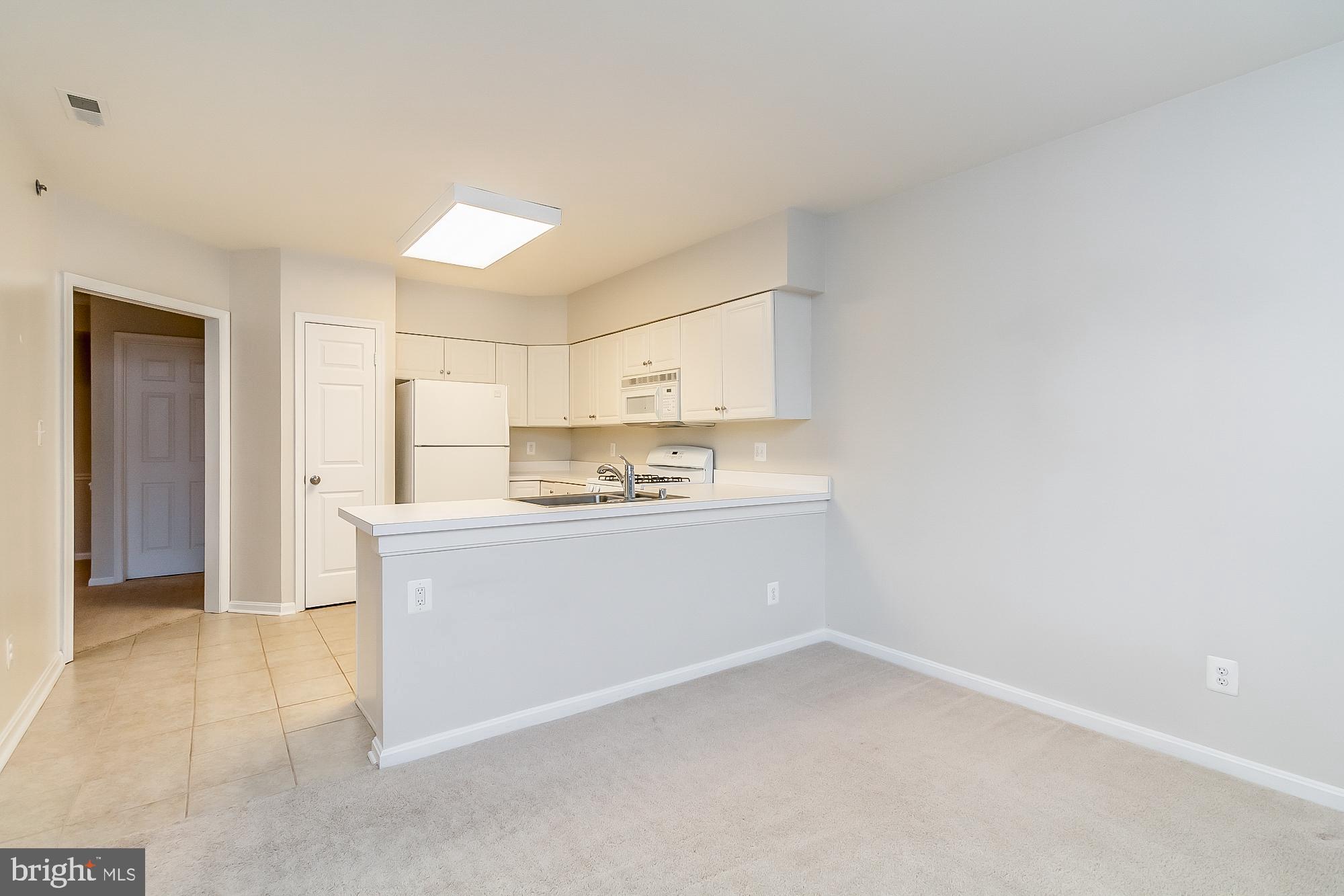 414 Rockfleet Road, Unit 201 Lutherville-Timonium, MD 21093 - Photo 11 of 35 Breakfast room off of kitchen