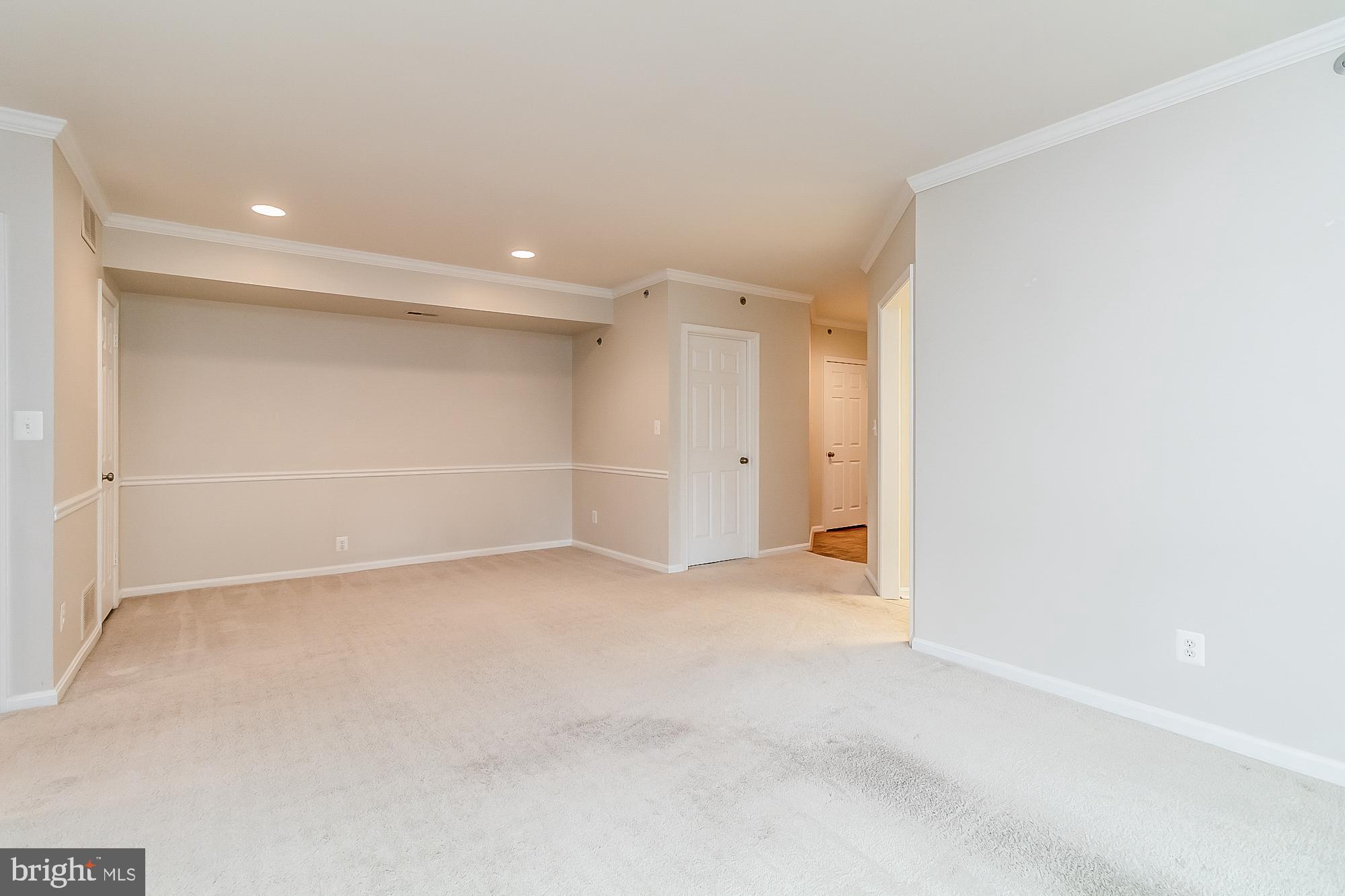414 Rockfleet Road, Unit 201 Lutherville-Timonium, MD 21093 - Photo 17 of 35 Combined living room/dining area