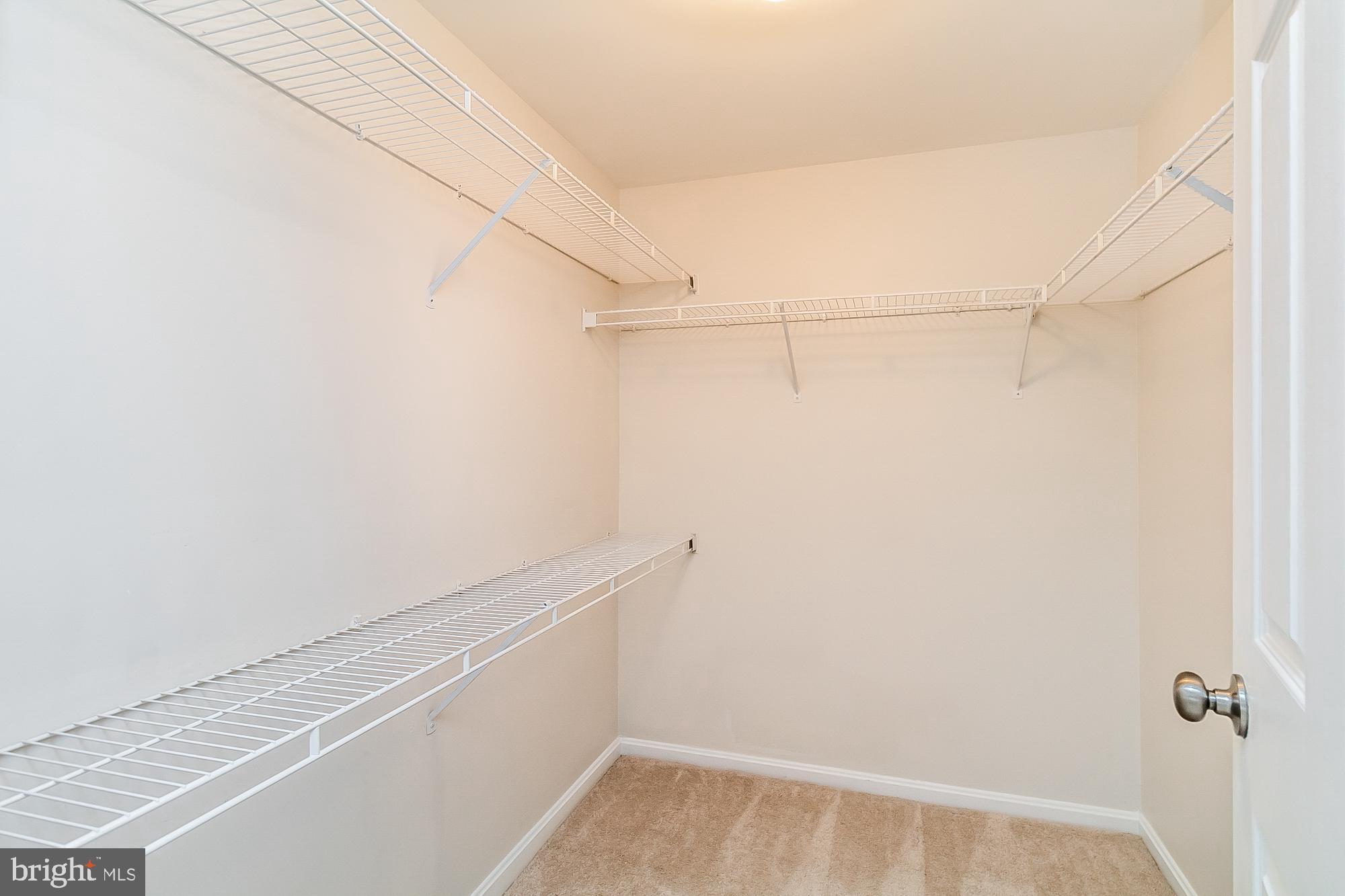 414 Rockfleet Road, Unit 201 Lutherville-Timonium, MD 21093 - Photo 25 of 35 Walk-in closet in primary bedroom