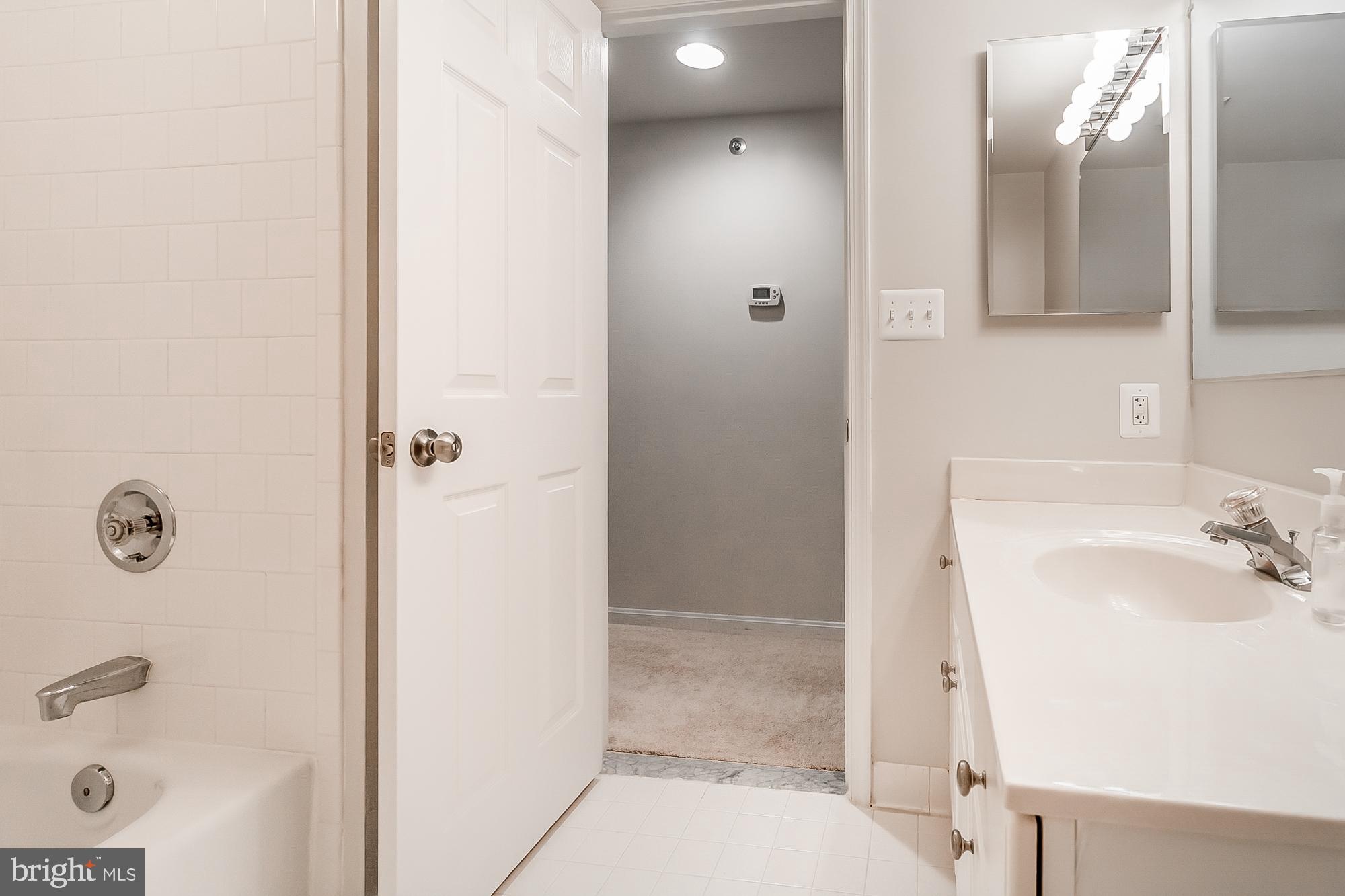414 Rockfleet Road, Unit 201 Lutherville-Timonium, MD 21093 - Photo 32 of 35 Guest bath has tub/shower combo