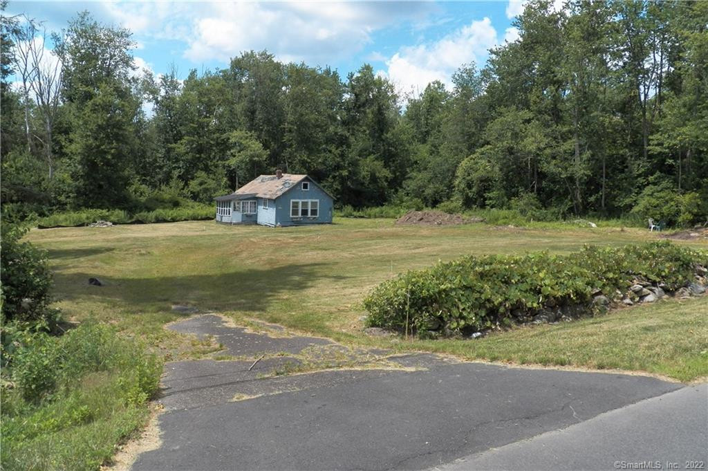 Welcome to 629 Bethmour RD. Here's the view from the East, lower curb cut onto Bethmour RD.