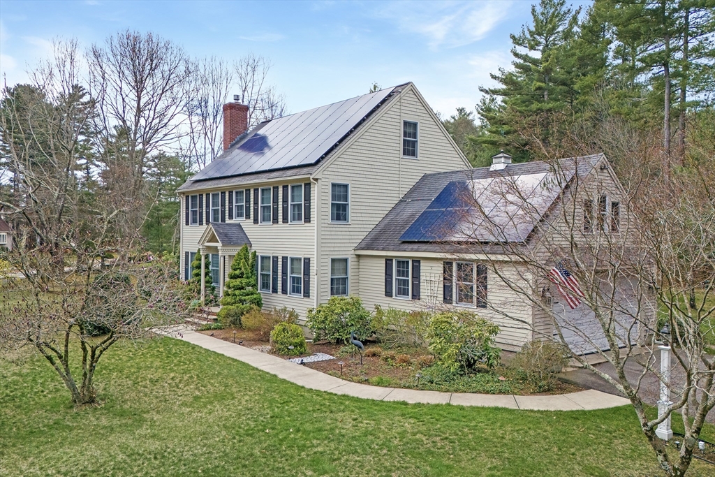 842 Main Street Wareham, MA 02571 - Photo 2 of 42 a front view of a house with a yard