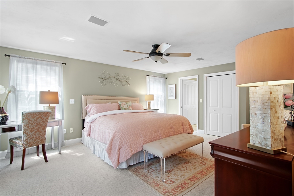 842 Main Street Wareham, MA 02571 - Photo 25 of 42 a bedroom with a bed and a desk