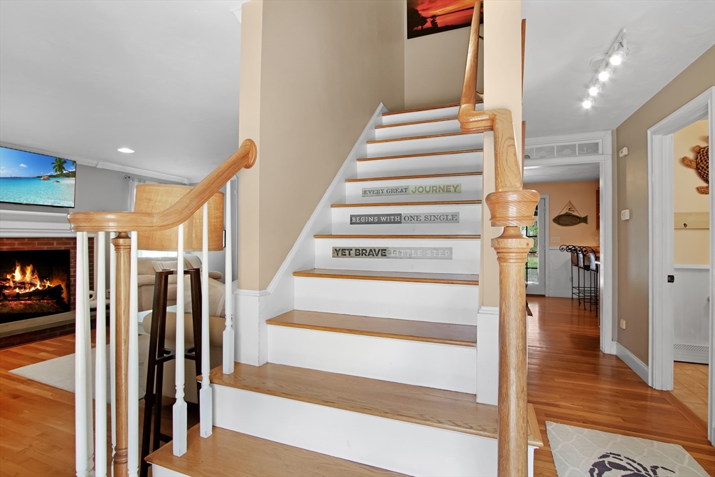 842 Main Street Wareham, MA 02571 - Photo 5 of 42 a view of entryway and hall with wooden floor