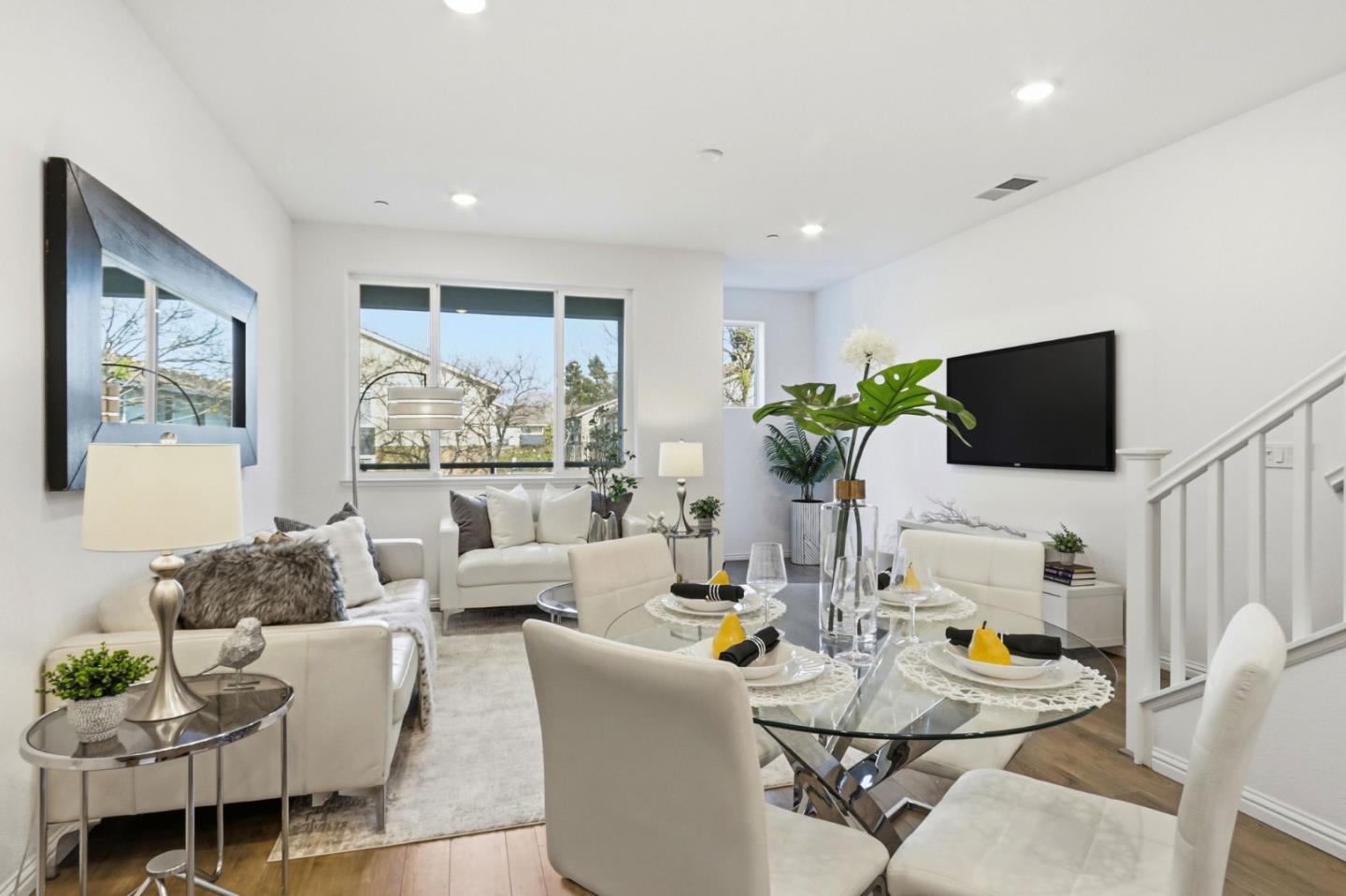 2580 Gimelli Way San Jose, CA 95133 - Photo 13 of 40 a living room with fireplace furniture and a flat screen tv
