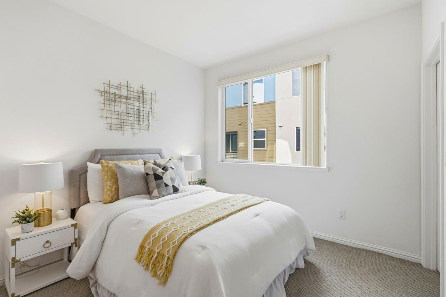 2580 Gimelli Way San Jose, CA 95133 - Photo 17 of 40 a bedroom with a bed and a window