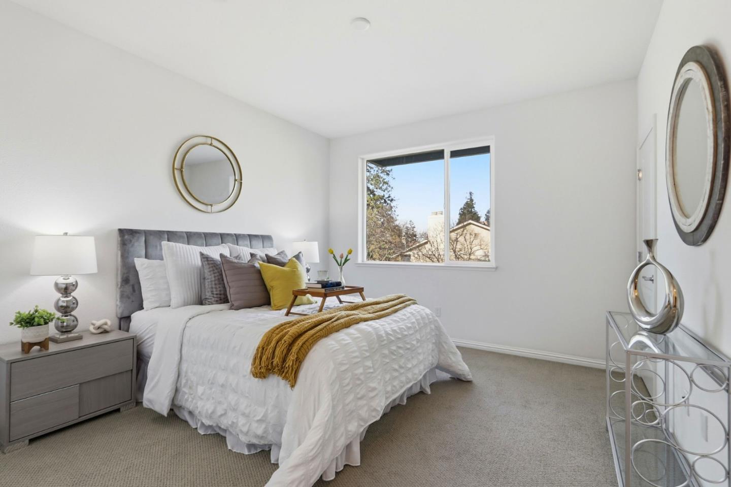 2580 Gimelli Way San Jose, CA 95133 - Photo 19 of 40 a bedroom with bed and a chandelier