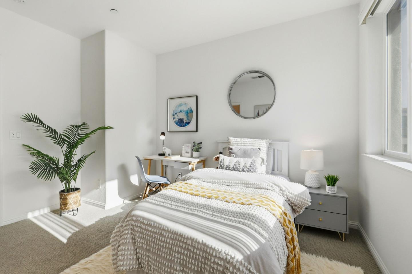 2580 Gimelli Way San Jose, CA 95133 - Photo 20 of 40 a bedroom with bed and a potted plant