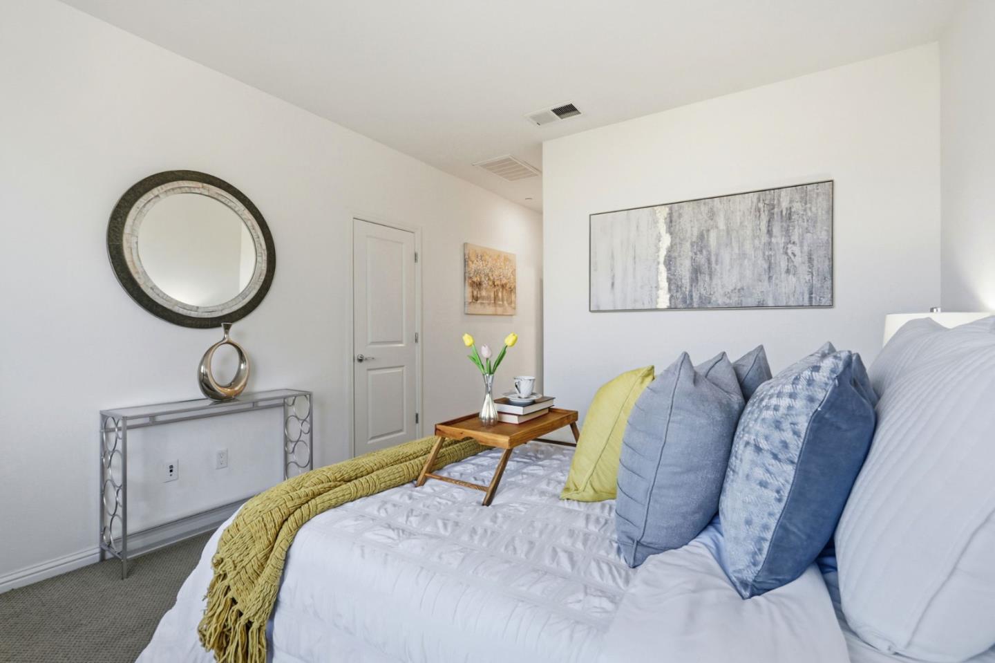 2580 Gimelli Way San Jose, CA 95133 - Photo 22 of 40 a bedroom with a bed a desk and chair