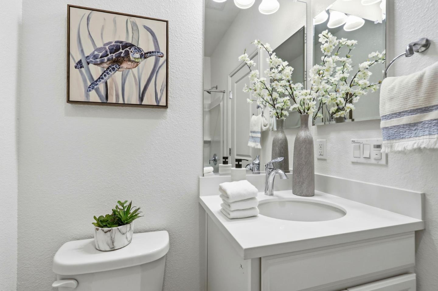 2580 Gimelli Way San Jose, CA 95133 - Photo 27 of 40 a bathroom with a sink and a mirror