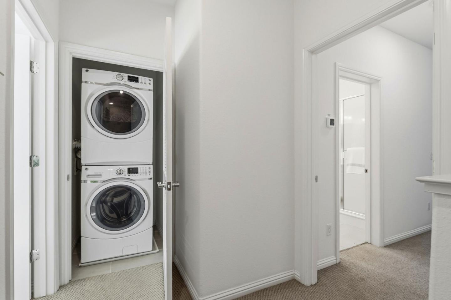 2580 Gimelli Way San Jose, CA 95133 - Photo 32 of 40 a utility room with dryer and washer