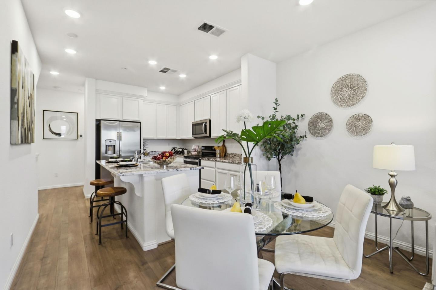 2580 Gimelli Way San Jose, CA 95133 - Photo 10 of 40 a living room with furniture and a potted plant