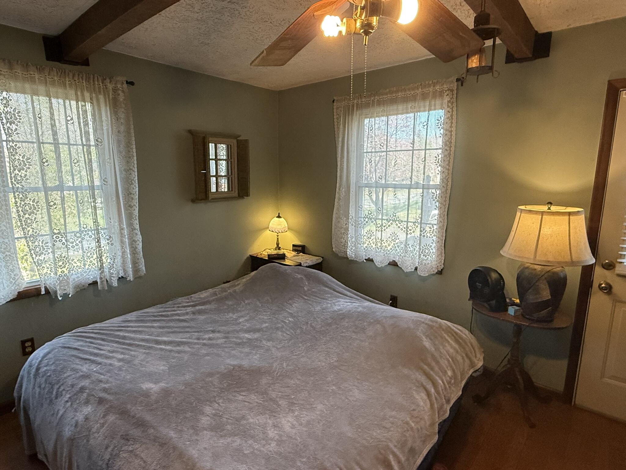 1708 Midland Trail Covington, VA 24426 - Photo 16 of 21 a bedroom with a bed and a window