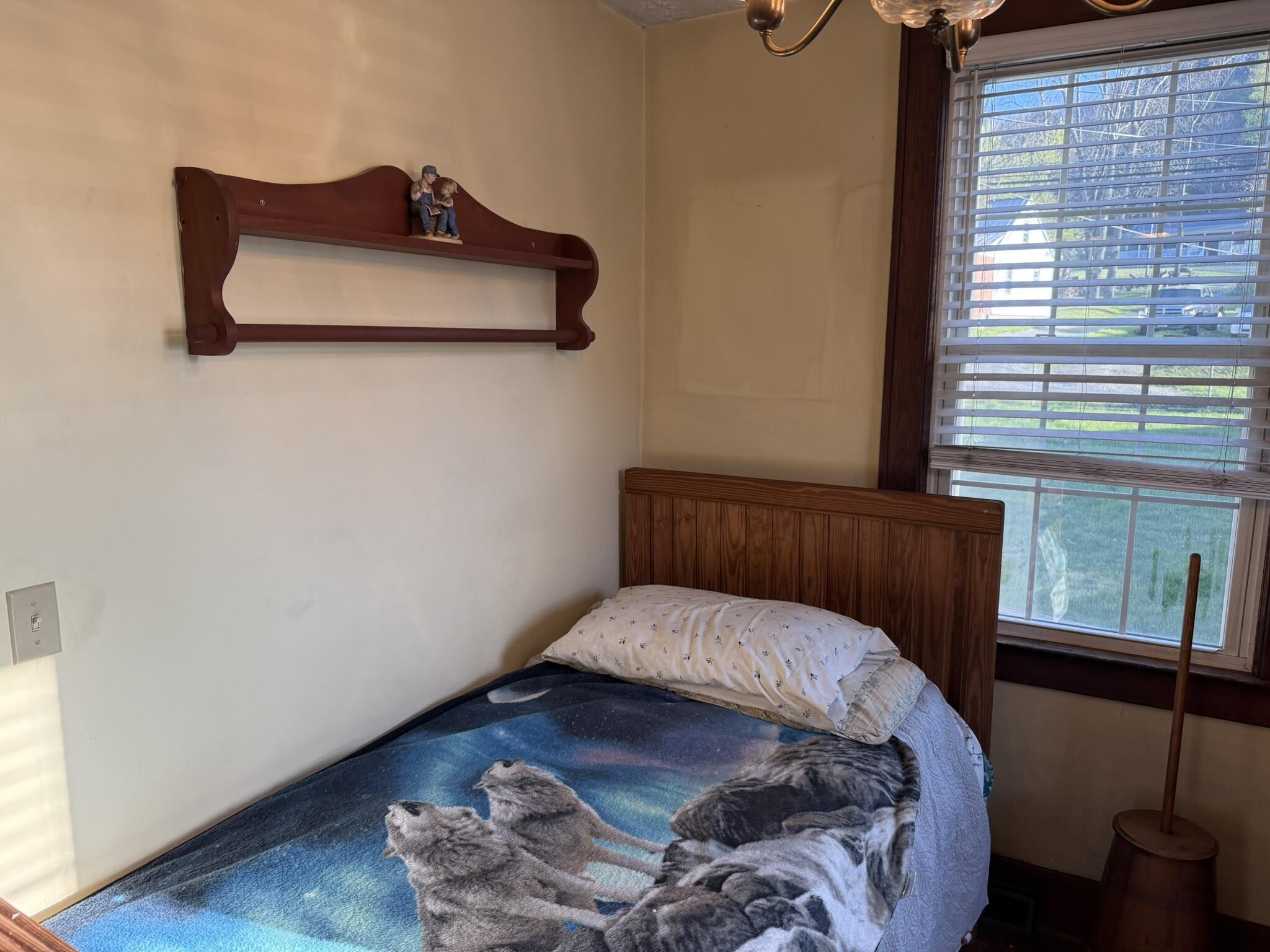 1708 Midland Trail Covington, VA 24426 - Photo 17 of 21 a bedroom with a bed and a window