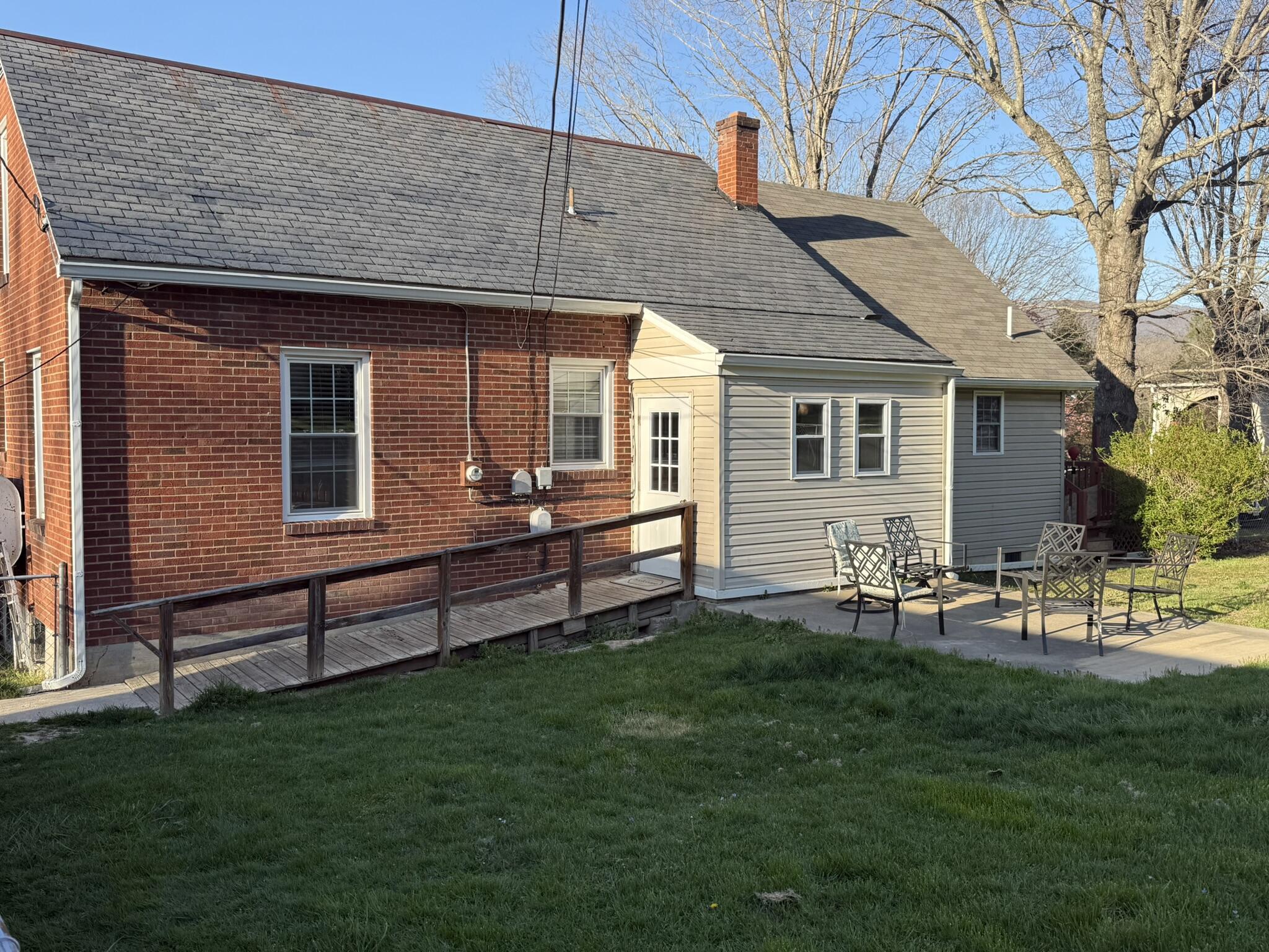 1708 Midland Trail Covington, VA 24426 - Photo 7 of 21 a front view of house with yard and outdoor seating