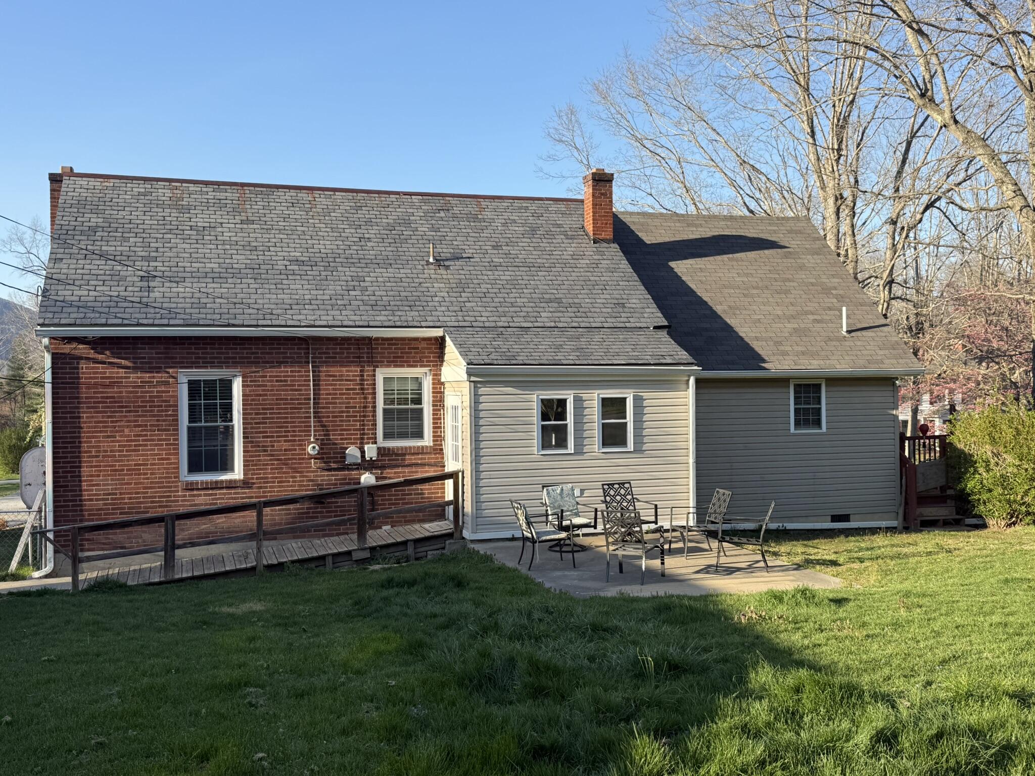 1708 Midland Trail Covington, VA 24426 - Photo 8 of 21 a backyard of a house with table and chairs