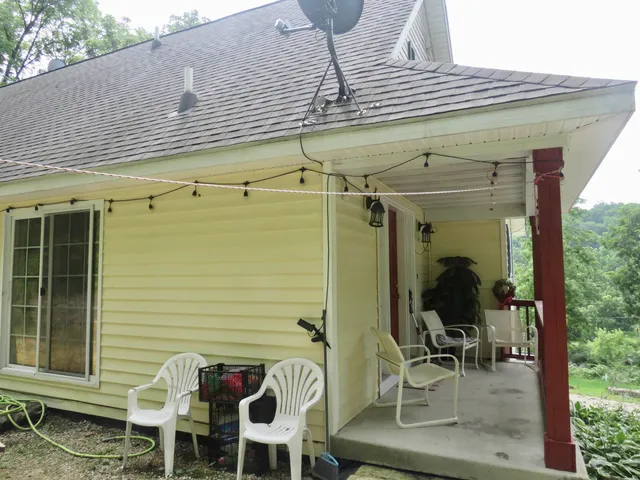 a view of a yard with furniture