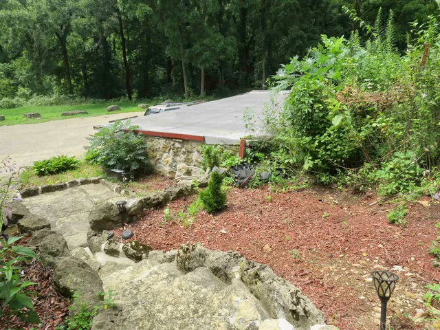 a front view of a house with garage