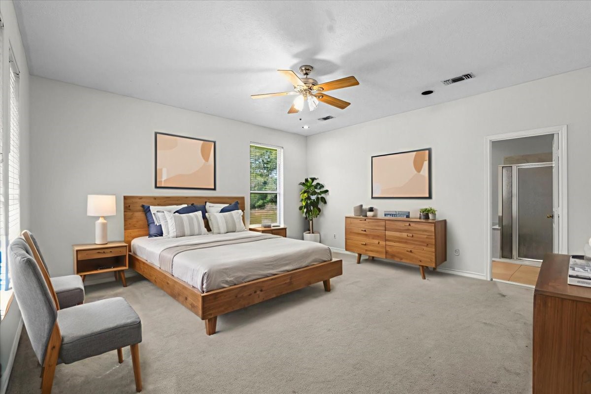 1607 Delta Lane Baytown, TX 77523 - Photo 22 of 48 Primary bedroom virtually staged.