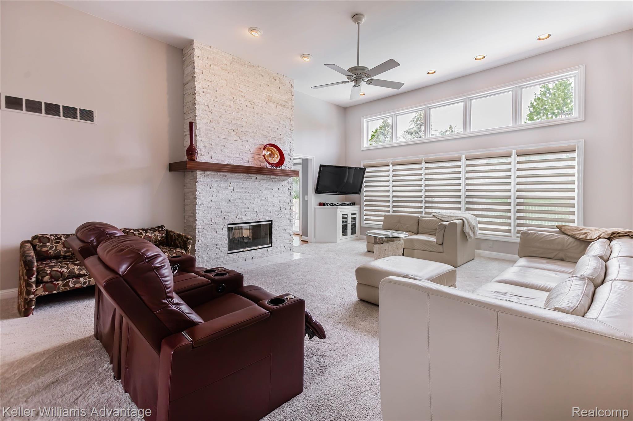 48436 Gladstone Road Canton, MI 48188 - Photo 12 of 41 Great Room with custom motorized window treatments