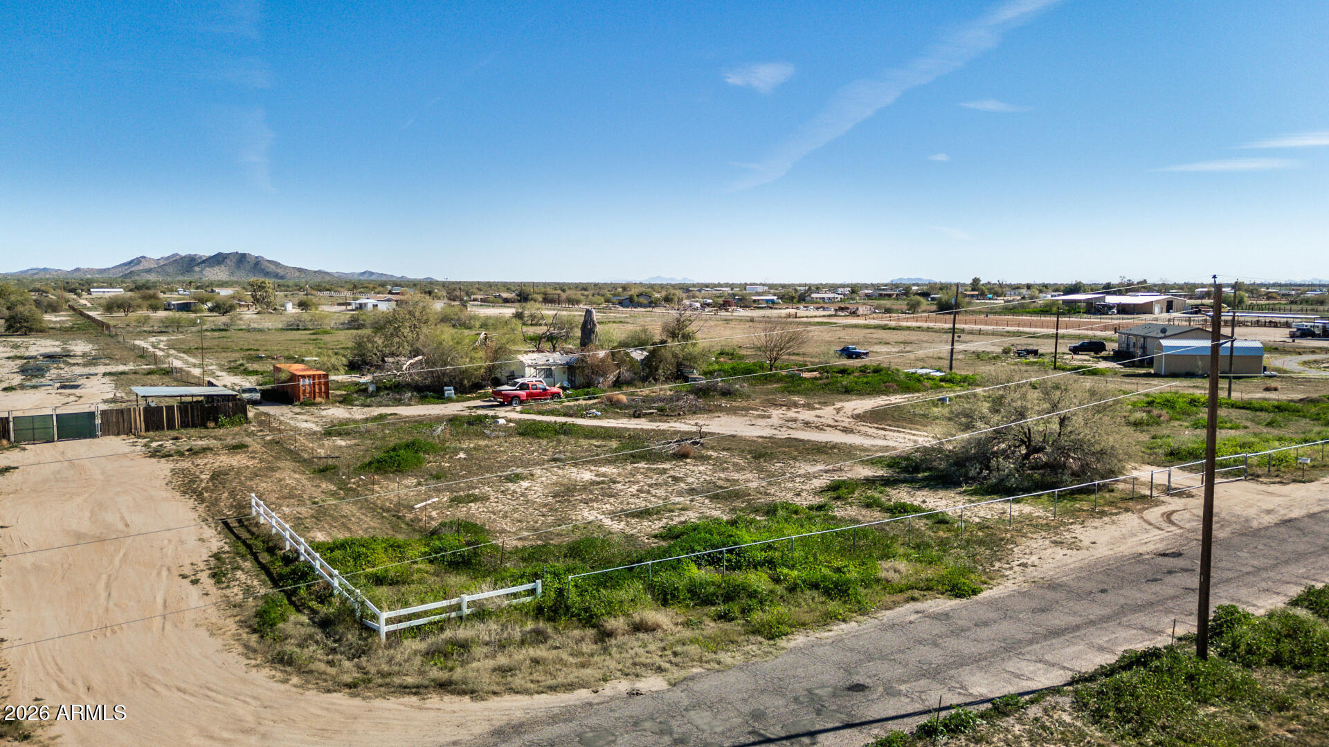 14081 North Santa Rosa Avenue, Unit 77 Maricopa, AZ 85138 - Photo 2 of 14 a view of a lake with a mountain