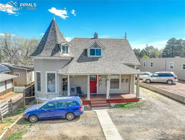 a car parked in front of a house