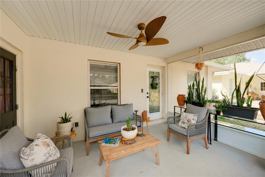 10318 Summerview Circle Riverview, FL 33578 - Photo 13 of 39 a living room with furniture and a large window