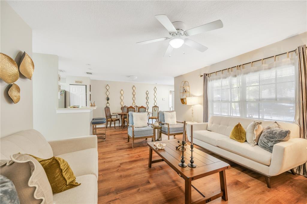 10318 Summerview Circle Riverview, FL 33578 - Photo 14 of 39 a living room with furniture and a large window