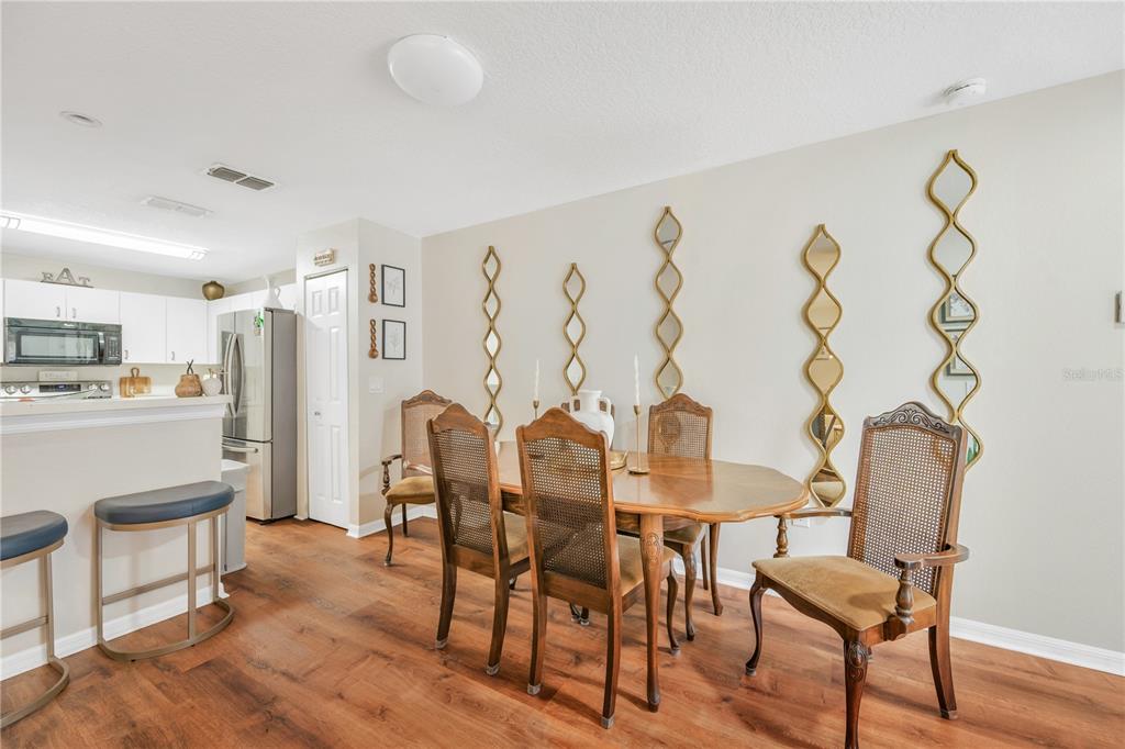 10318 Summerview Circle Riverview, FL 33578 - Photo 27 of 39 a living room with furniture and wooden floor