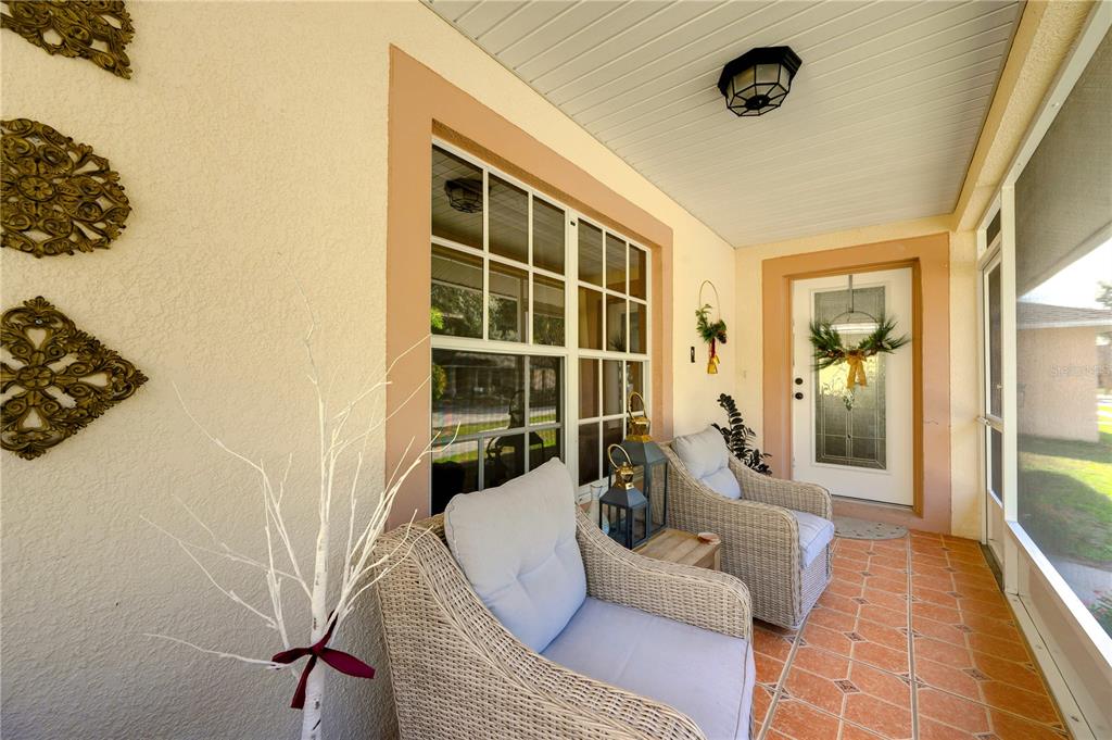 10318 Summerview Circle Riverview, FL 33578 - Photo 8 of 39 a living room with furniture and a floor to ceiling window