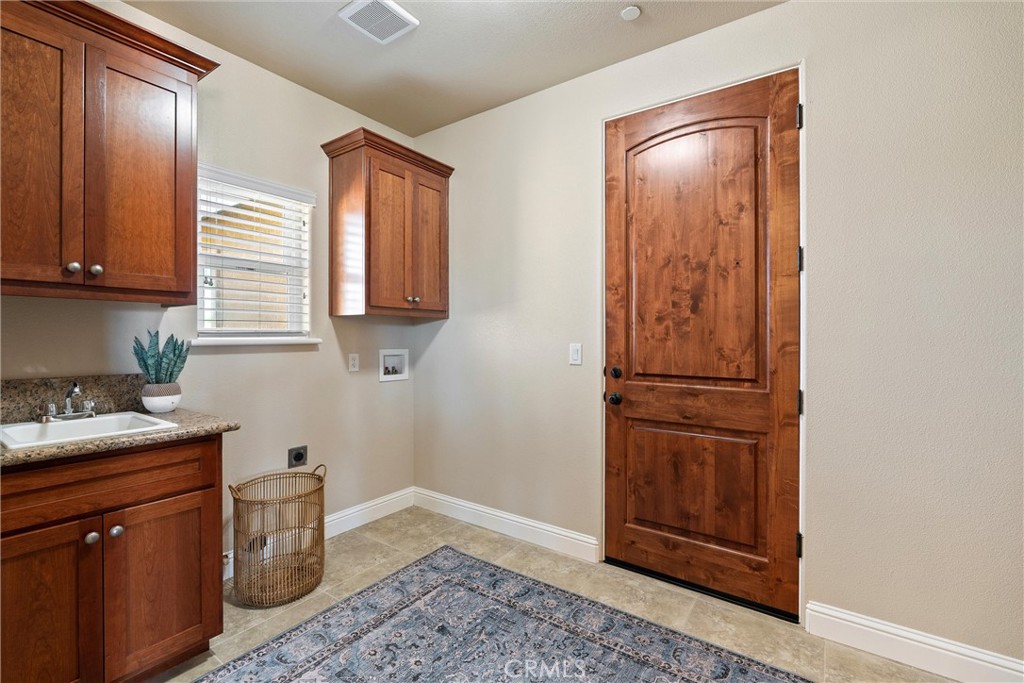 3882 Spyglass Road Chico, CA 95973 - Photo 29 of 71 Laundry Room, garage door entrance door on the right