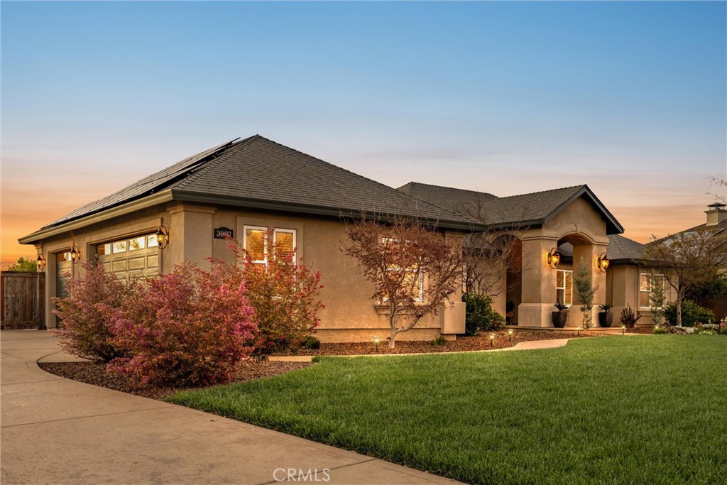 3882 Spyglass Road Chico, CA 95973 - Photo 10 of 71 Sunset View, side of home, garages to the left