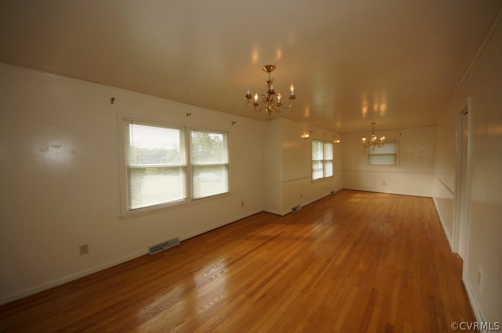2244 Pony Farm Road Maidens, VA 23102 - Photo 3 of 13 a view of empty room with wooden floor and fan
