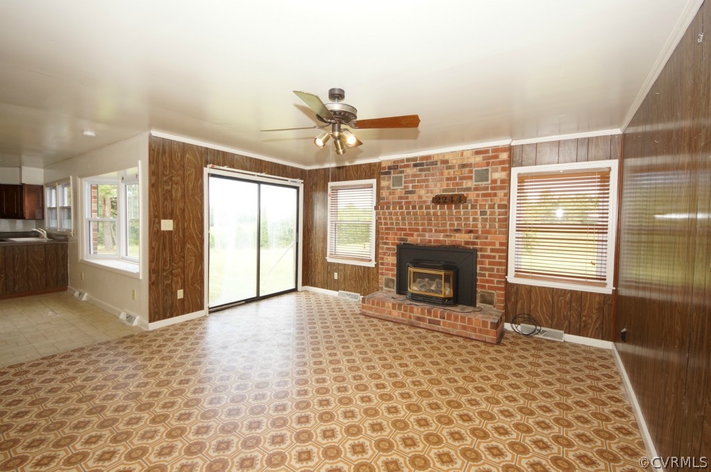 2244 Pony Farm Road Maidens, VA 23102 - Photo 6 of 13 a view of an empty room with a fireplace and a window
