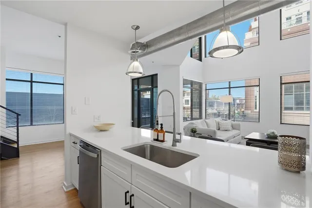 a bathroom with a sink and a large mirror