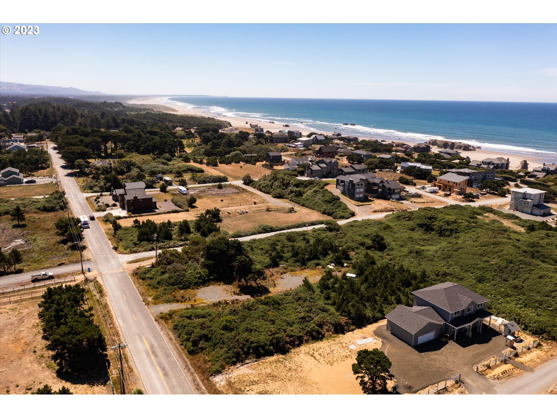 0 Beach Loop Bandon, OR 97411 - Photo 12 of 13 an aerial view of residential building and ocean