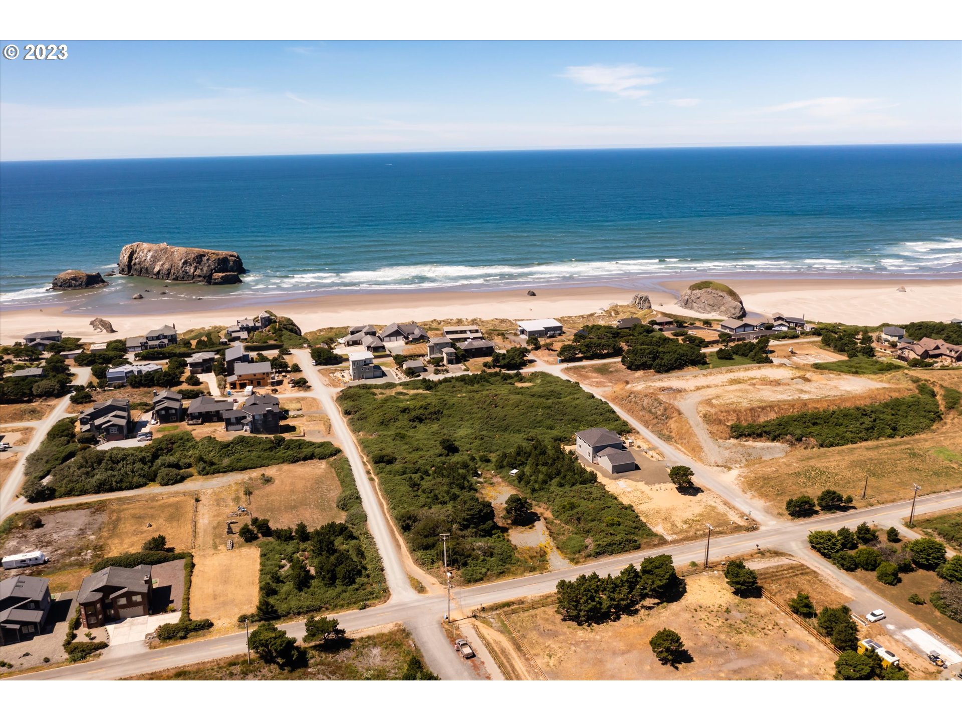 0 Beach Loop Bandon, OR 97411 - Photo 8 of 13 an aerial view of residential building and ocean