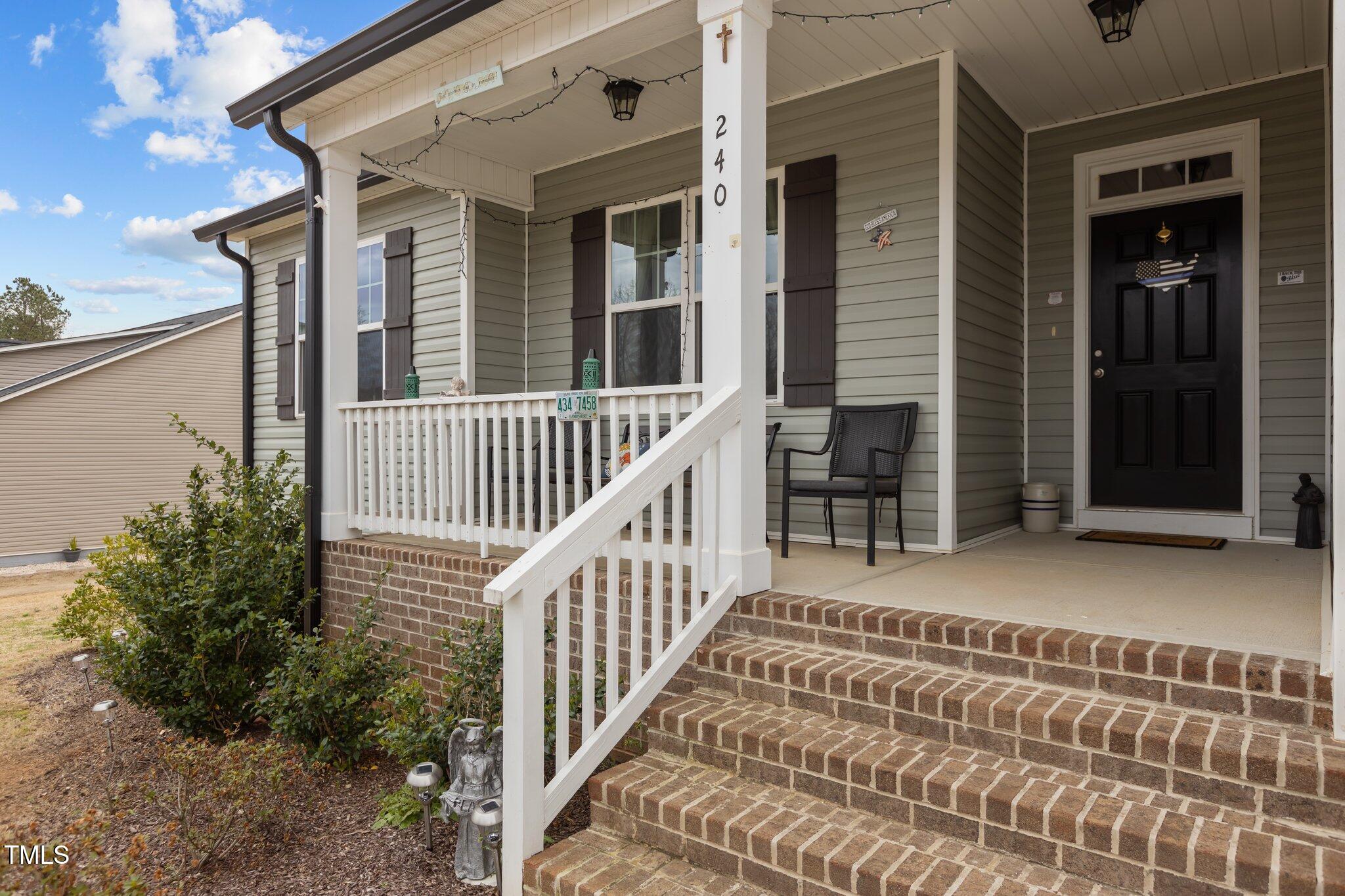 240 Northview Drive Middlesex, NC 27557 - Photo 11 of 58 a view of a house with backyard and porch