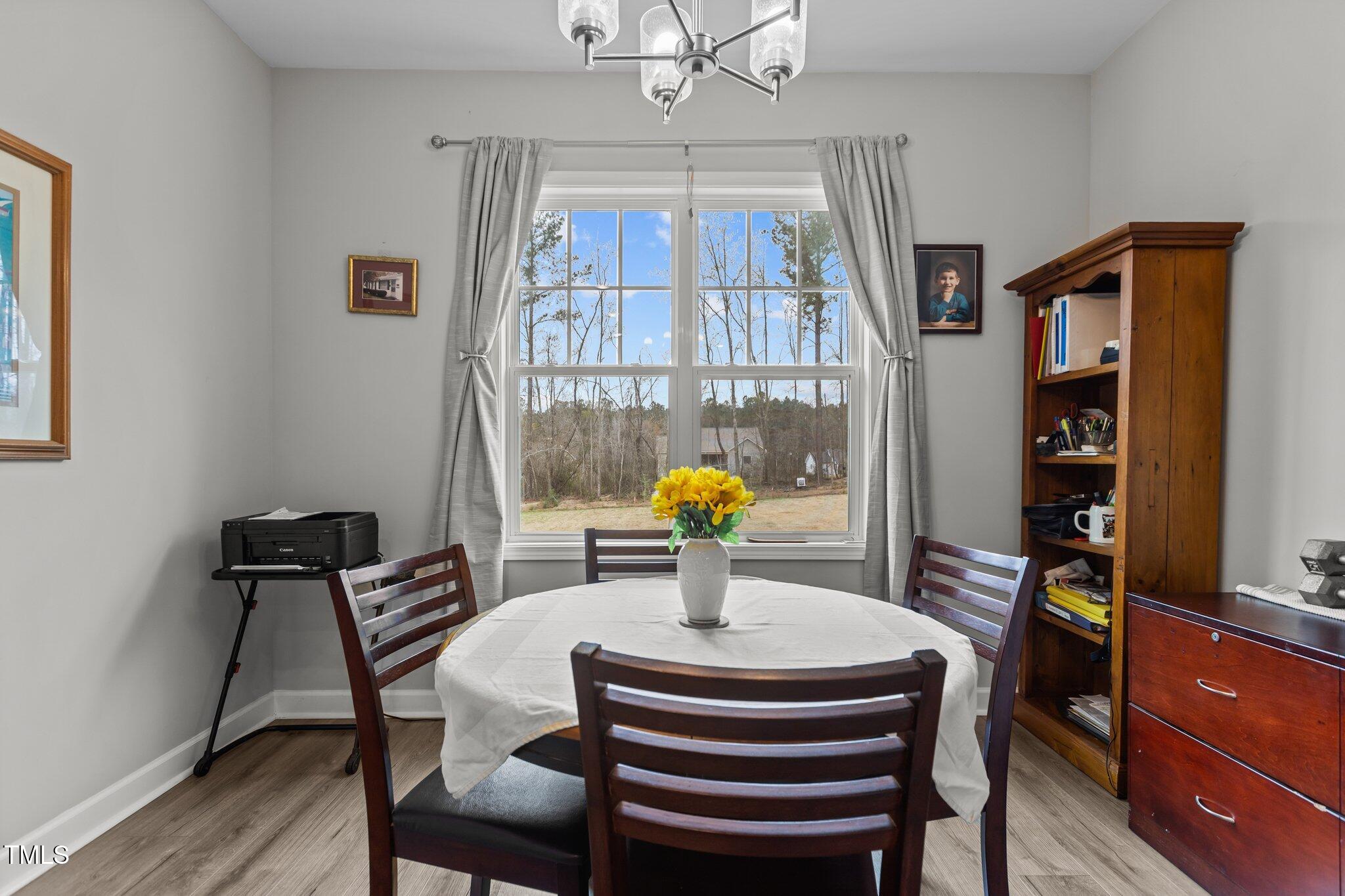 240 Northview Drive Middlesex, NC 27557 - Photo 23 of 58 a dining room with furniture and window