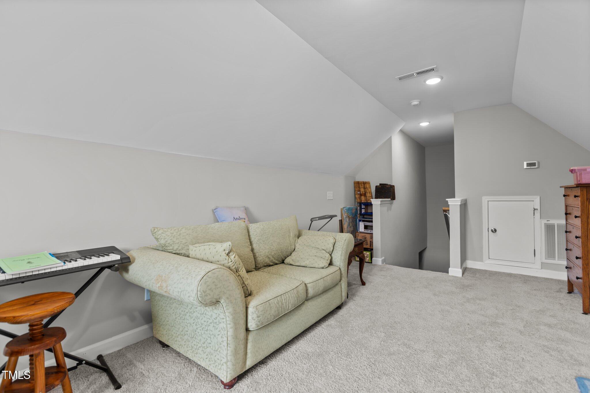 240 Northview Drive Middlesex, NC 27557 - Photo 32 of 58 a living room with furniture and a couch