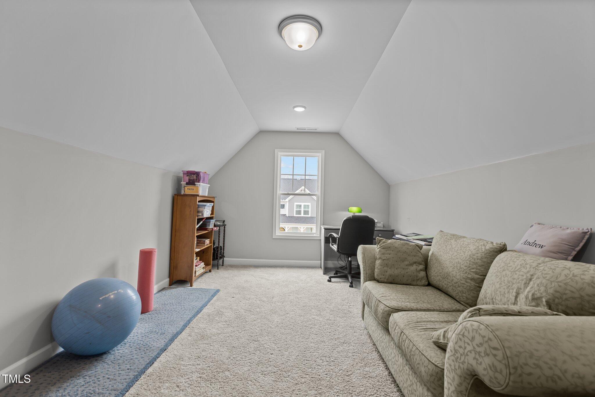 240 Northview Drive Middlesex, NC 27557 - Photo 33 of 58 a living room with furniture and a wooden floor