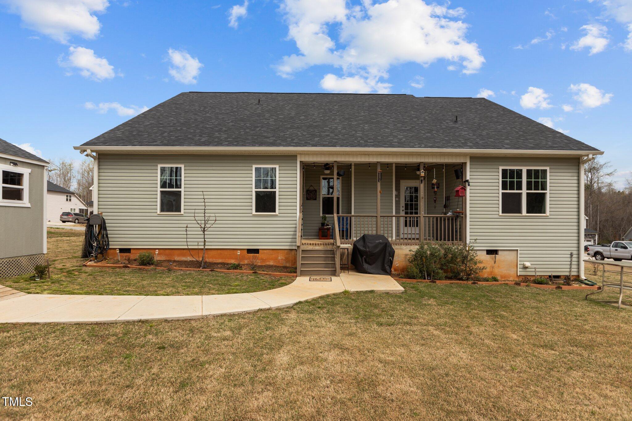 240 Northview Drive Middlesex, NC 27557 - Photo 41 of 58 a view of a house with backyard and sitting area
